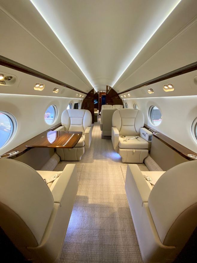 Luxurious private jet interior with leather seating